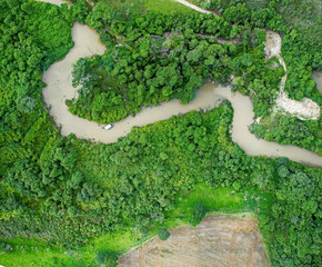 Aerial View of Piracanjuba River, Aerial View of Piracanjuba River, in the Brazilian Cerrado region in Minas Gerais, where gold mining is carried out by illegal miners. Brazil, July 2020.
