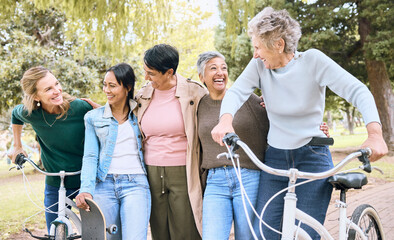 Senior people, friends and laughing on bike in joyful happiness enjoying fun time together at the park. Group of elderly women bonding and sharing joke, laugh or walking and cycling in the outdoors