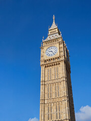 Fototapeta na wymiar Elizabeth Tower, also known as Big Ben, is the clock tower of the Houses of Parliament. It is a symbol of the city. Westminster, London, United Kingdom