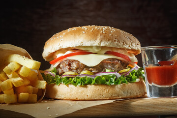 appetizing burger on a dark background