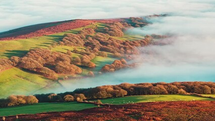 Timelapse of fog moving over valleys and hills during an inversion