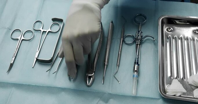 Sterile instruments at the dental clinic. tools for tooth treatment. instruments for examining teeth on the dentist's table. Sterile instruments in a modern dental clinic for tooth extraction