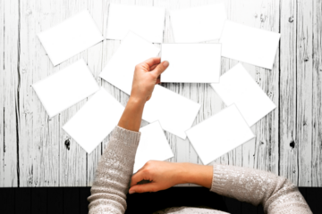 a woman looking at photos, png file