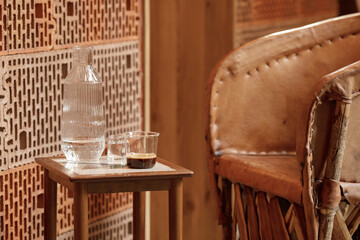 Fototapeta na wymiar Glass of espresso and water set on coffee table