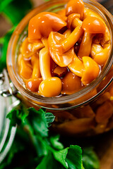 Fragrant marinated mushrooms. Macro background.