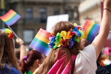 Women with colorful rainbow wreaths - symbol of LGBT pride
