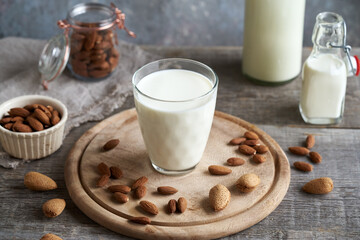 A glass of almond milk with almonds