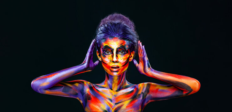 Girl with art colorful make-up and bodyart or body paints. Download photo for cover on your video project. Covers for books mixtape and video clips