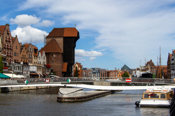 Gdańsk architecture and an old port crane by the Motława River