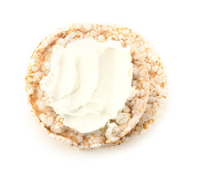 Crispbreads with tasty cream cheese on white background