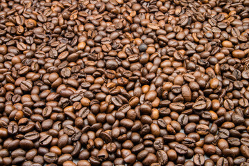 Roasted coffee beans background
Freshly roasted coffee beans.
