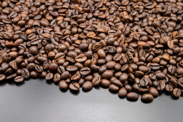 Roasted coffee beans background
Freshly roasted coffee beans.
