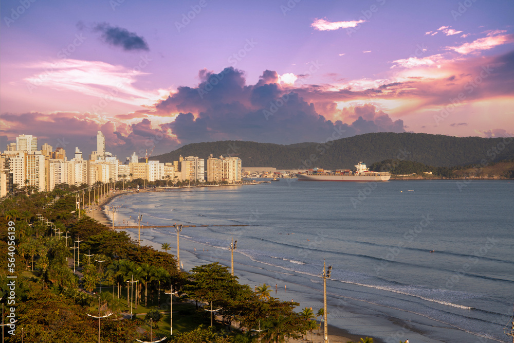 Wall mural santos beach panoramic view from above. with sunset in the background