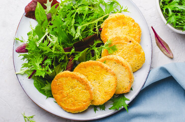 Tofu Patties, Fritters, Vegetarian Food, Vegan Soy Bean Pancakes, Savory Appetizer with fresh salad on a plate