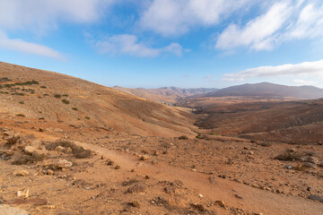 Fototapeta na wymiar Desert landscape with mountains terraine. Caldera of an ancient volcano.