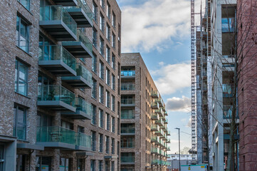 Fototapeta premium London, United Kingdom, 19 January 2023: Chamberlain Court.Upton Gardens redevelopment of a old West Ham United Football Stadium in East London, Green Street