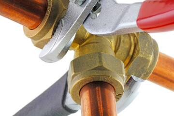 Plumber using wrenches adjusting pipework ,transparent png.