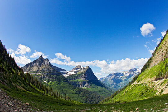 Wide angle view of Glacier National Park from the top of Logan's Pass. 