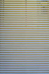 Metal ribbed sheet. abstract vertical textural linear background.