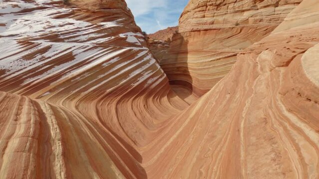 The Wave POV unique sandstone in snow at Coyote Buttes wilderness Arizona Utah border USA. 