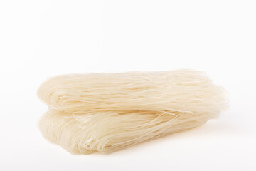 Dried noodles with rice flour isolated on white background.