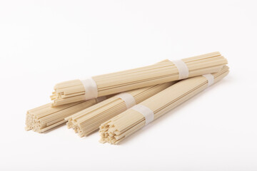 Dried noodles with rice flour isolated on white background.