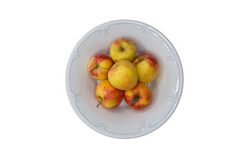 fresh apples in white bowl, top view