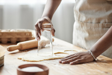 Black woman baking homemade pastry