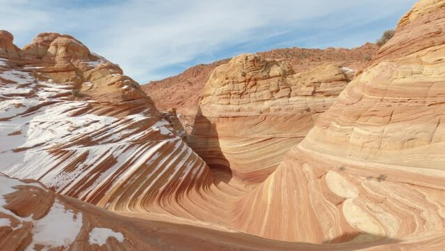 The Wave POV unique sandstone at Coyote Buttes wilderness Arizona Utah border USA in winter.