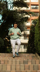 Fototapeta premium young sportsman exercising athletes going down stairs 