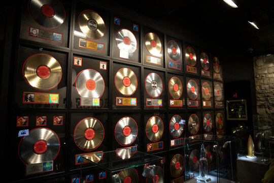 A wall of gold and platinum records from Johnny Cash on display inside of the Johnny Cash Museum in Nashville Tennessee USA