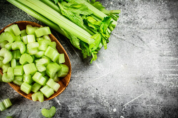 Cut into small pieces of celery in a plate. 