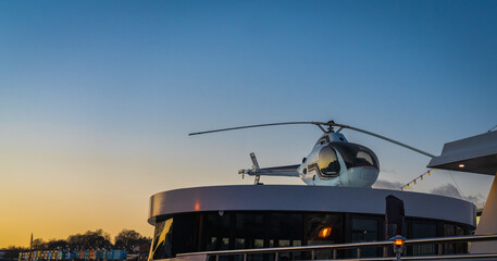 Helicopter over a boat in Bristol England