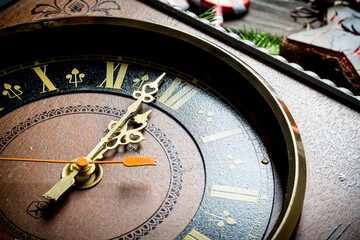 Fototapeta na wymiar Christmas clock showing one minute to midnight.
