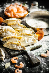 Making gyoza dumplings with shrimp at home. 