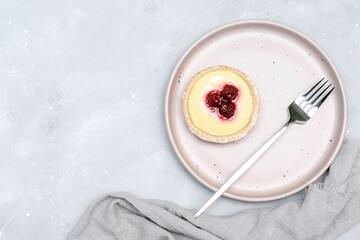 raspberry strawberry whipped creamy tartlets.confection dessert.pastry cheesecake with ripe berries