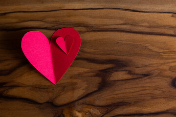 Red hearts on wood