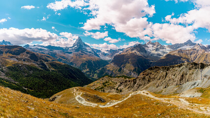 Majestic mountain valley in summer at Zermatt. Aerial view from the walking path to Lake Stellisee.