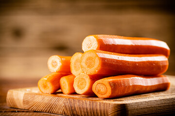Fresh carrots on a cutting board. 