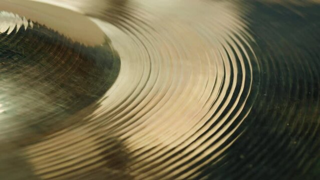 Macro shot of drum Steel copper cymbals, instrument parts, drum kits, texture