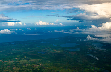 Landscape pov from plane travel drone clouds over ocean cartagena colombia