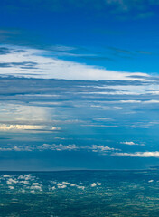 Naklejka na ściany i meble Landscape pov from plane travel drone clouds over sea of cartagena de indias colombia