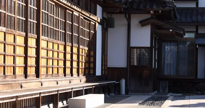 Morning sun hits traditional Japanese sliding doors 