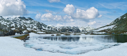 Spring alps mountain lake Lago della Piazza (Switzerland, Passo del San Gottardo)