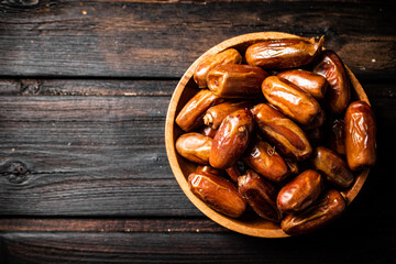 Ripe dates on a plate. 
