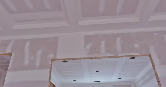 In new construction of house plastering drywalling has been completed is ready for painting once it is completed