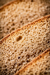 Slices of rye bread. Macro background. 
