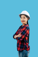 Young female engineer wearing yellow helmet stand with charming smile posture