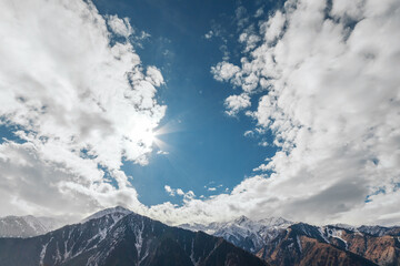 Almaty mountains landscape with picturesque cloudy sky. Nature of Kazakhstan.