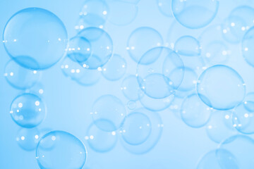Beautiful Transparent Blue Soap Bubbles Abstract Background. Soap Sud Bubbles Water.